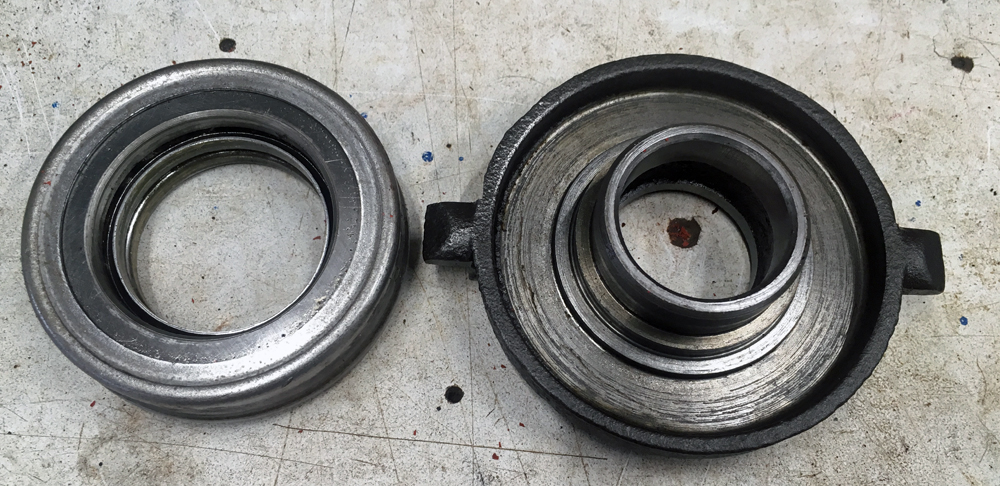 Power King throwout bearing carrier (right) and bearing.
 (Photo © Russ Chastain)