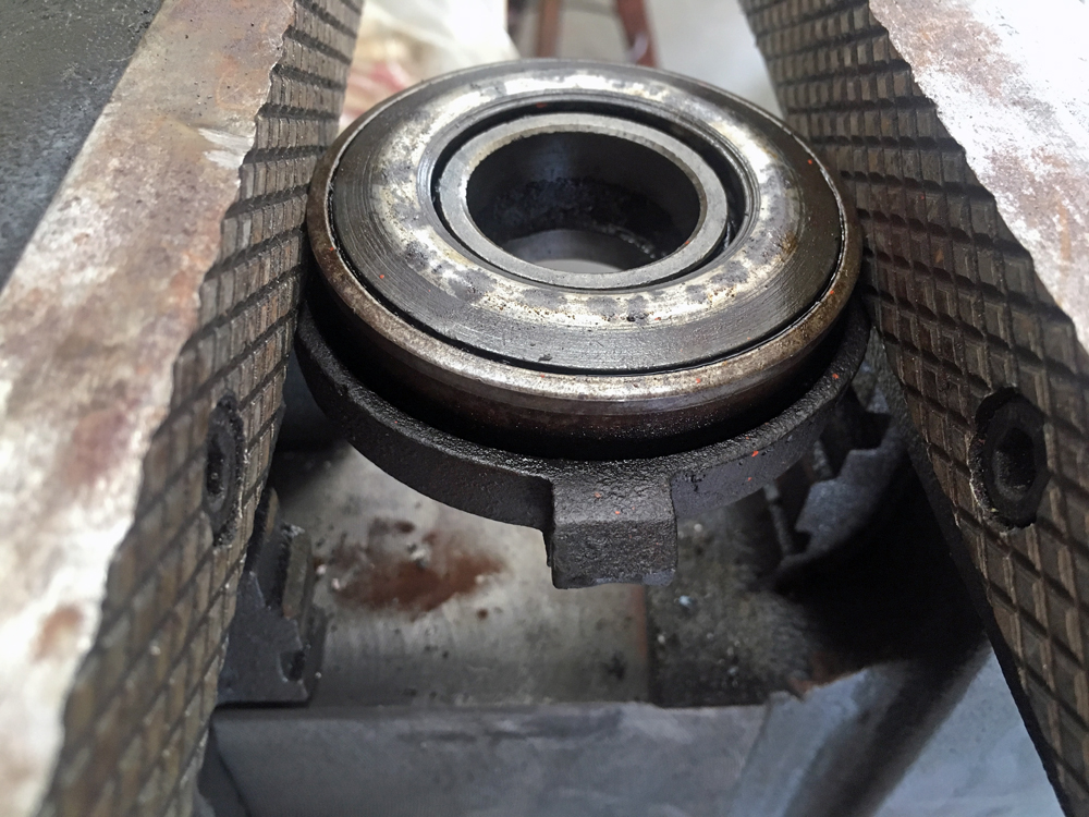  Dissassembling a Power King tractor throwout bearing.  (Photo © Russ Chastain)