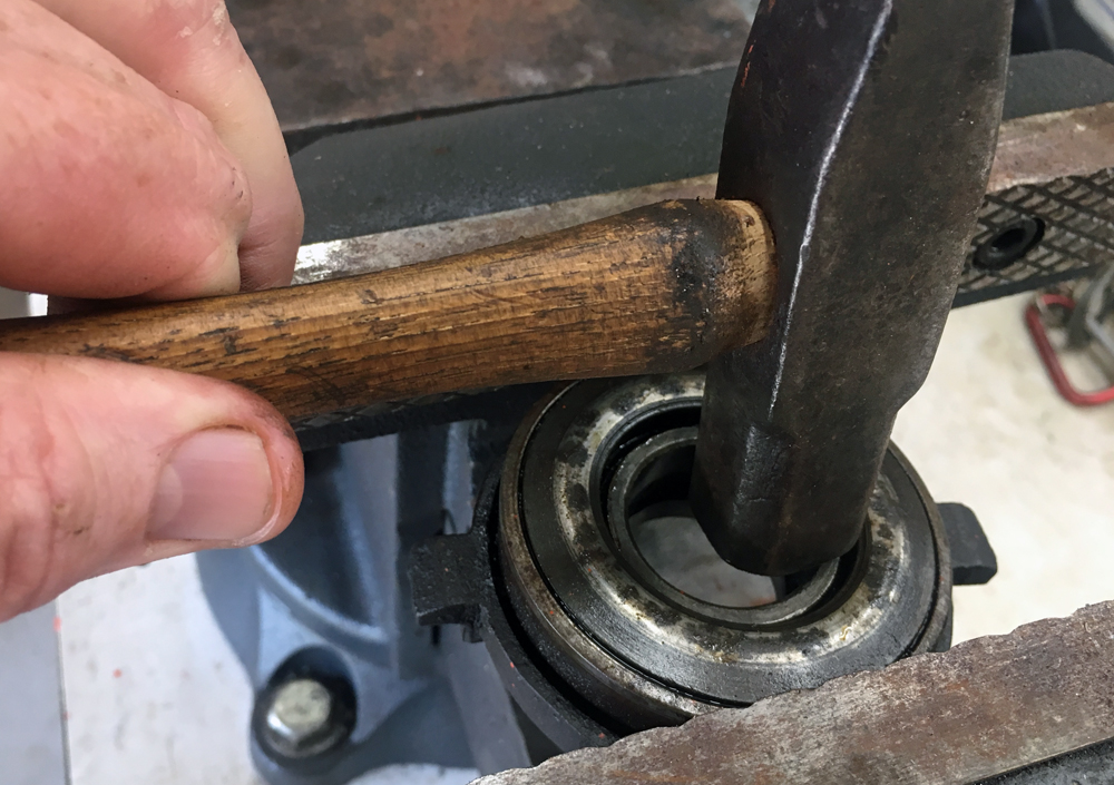 Dissassembling a Power King tractor throwout bearing.  (Photo © Russ Chastain)